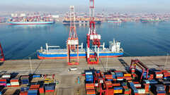 China's annual trade surplus hits a record $1.2 trillion as December exports sharply beat estimates